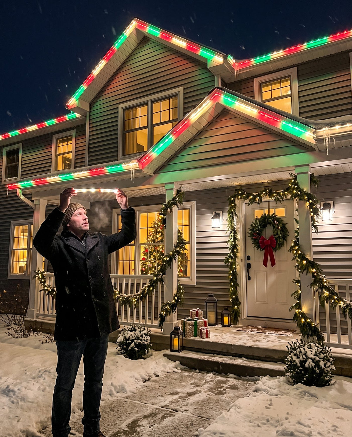 The Eaves permanent outdoor LED roofline lights — puck size at the front door